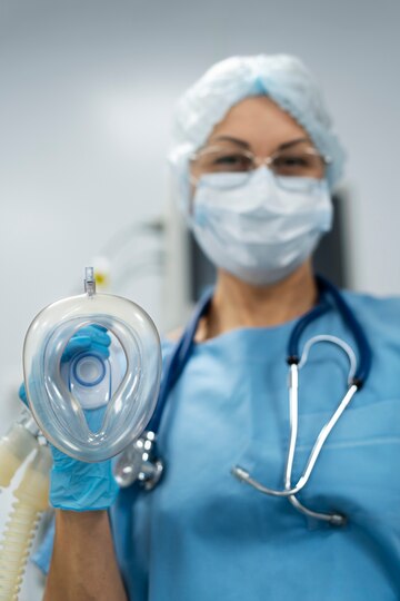 doctor-holding-respirator - O2 For Everyone